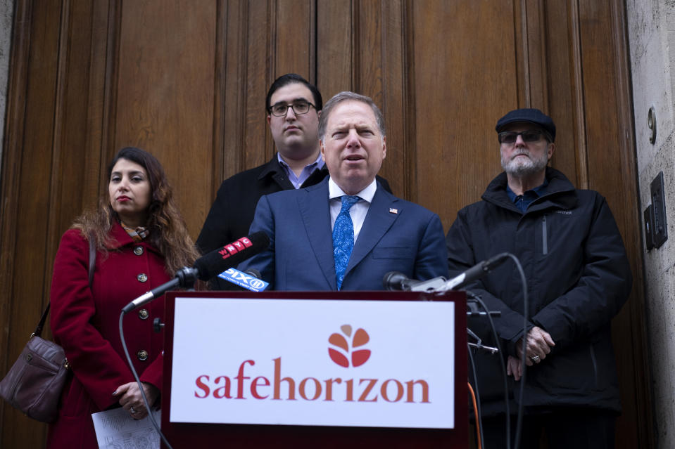 U.S. Attorney Geoffrey Berman, standing with victims of childhood sexual abuse, speaks at an event held by Safe Horizon, a non-profit victim services agency, in front of Jeffrey Epstein's Manhattan residence as they raise awareness for New York State's Child Services Act, Monday, Jan. 27, 2020, in New York. During the news conference, Berman said Britain's Prince Andrew has provided “zero cooperation” to the American investigators who want to interview him about his dealings with the late millionaire sex offender Jeffrey Epstein. (AP Photo/Craig Ruttle)