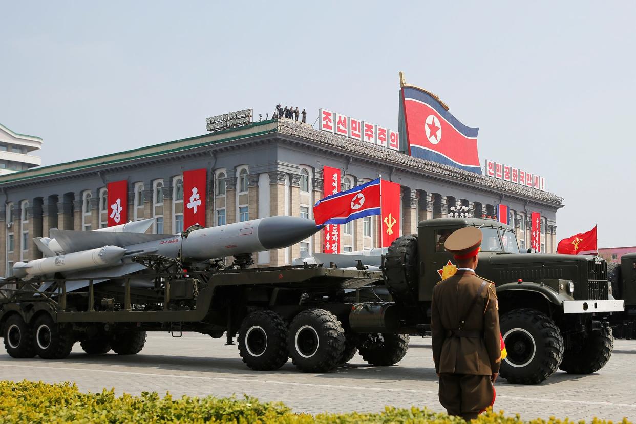 Missiles are driven past the stand with North Korean leader Kim Jong Un and other high ranking officials during a military parade marking the 105th birth anniversary of North Korea's founding father, Kim Il Sung, in Pyongyang, April 15, 2017. REUTERS/Sue-Lin Wong - RTS12FMQ