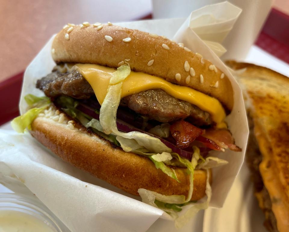 The bacon cheeseburger is an all-beef patty charbroiled and served on a sesame seed bun with “the works,” including lettuce, tomato, onion, pickle and signature Best Burger Sauce.