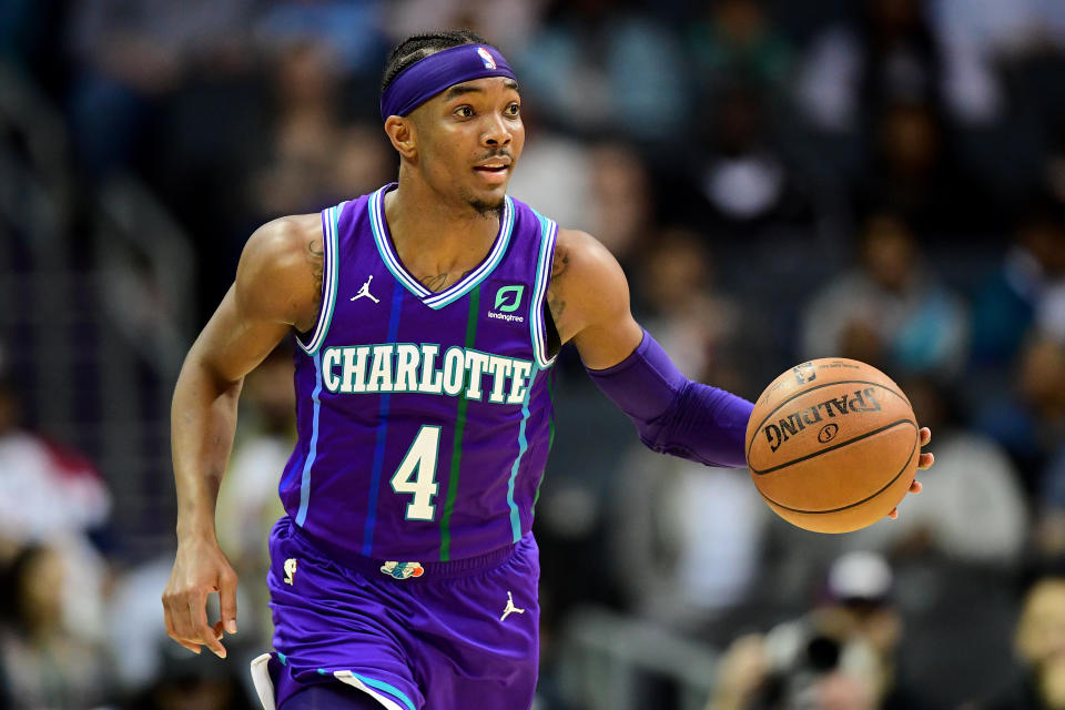 CHARLOTTE, NORTH CAROLINA - DECEMBER 27: Devonte' Graham #4 of the Charlotte Hornets with the ball during the fourth quarter during their game against the Oklahoma City Thunder at the Spectrum Center on December 27, 2019 in Charlotte, North Carolina. NOTE TO USER: User expressly acknowledges and agrees that, by downloading and/or using this photograph, user is consenting to the terms and conditions of the Getty Images License Agreement. (Photo by Jacob Kupferman/Getty Images)