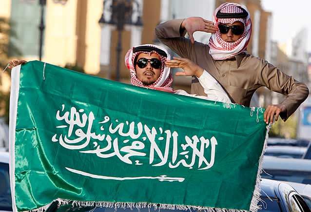 Image 3: The Saudi Arabia flag, which says “There is no God but Allah, and Muhammad is his messenger”. Photo: AP