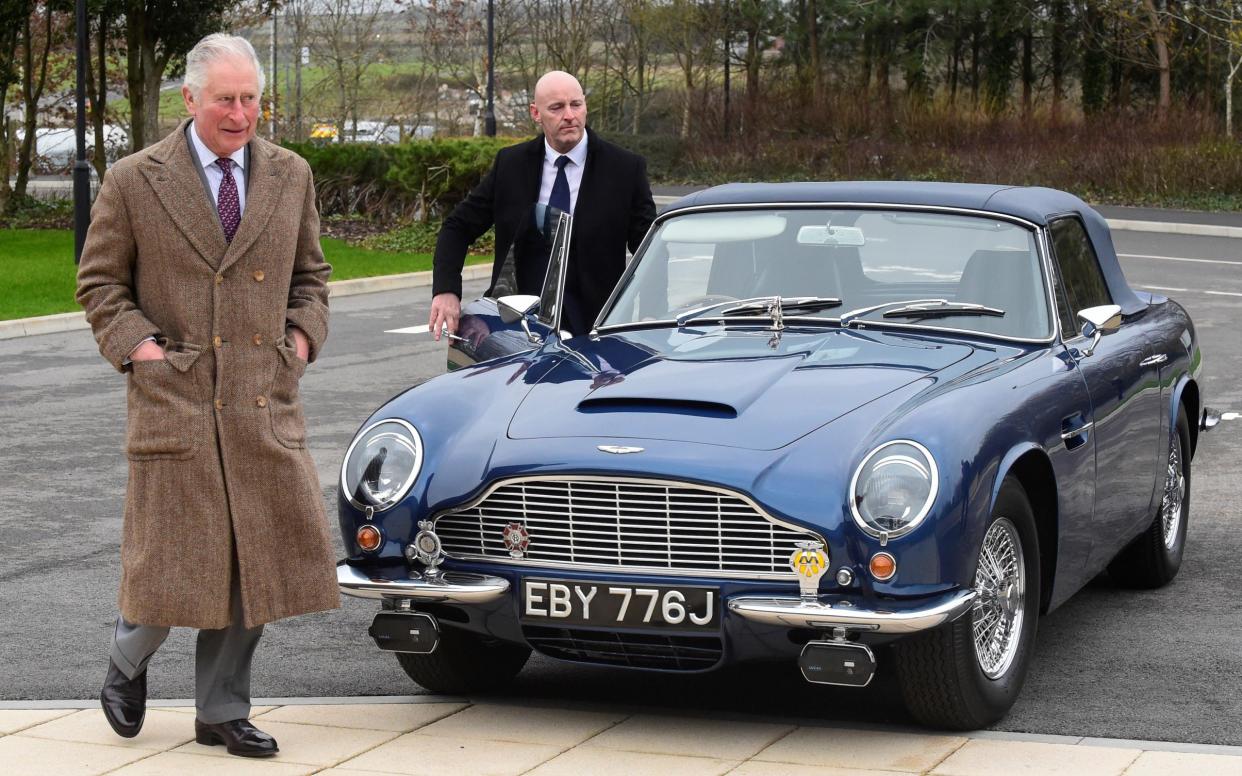 King Charles with the Aston Martin DB6