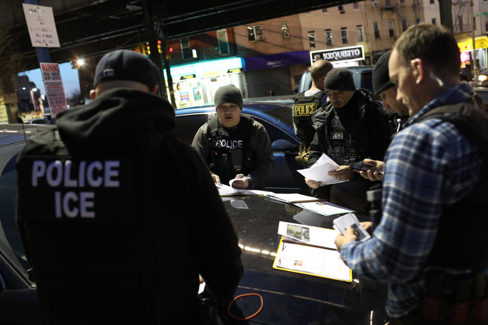 U.S. Immigration and Customs Enforcement (ICE) officers prepare for morning operations to arrest undocumented immigrants on April 11, 2018 in New York City.  / Credit: John Moore / Getty Images
