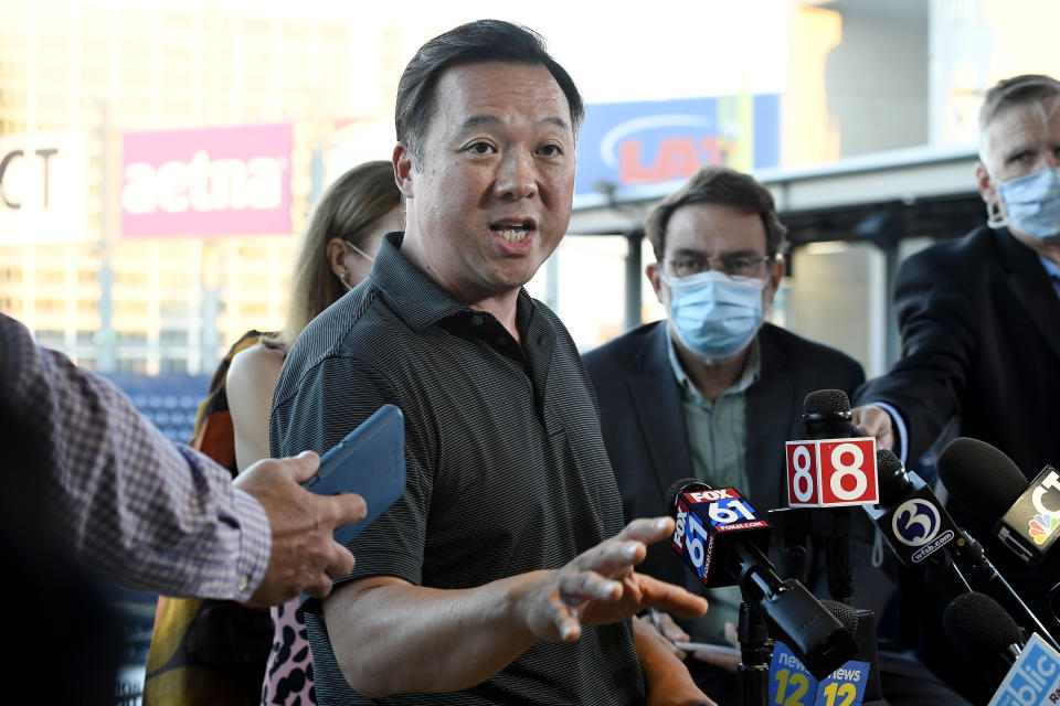 FILE - In this Thursday, Aug. 20, 2020, file photo, Connecticut Attorney General William Tong speaks to the media during a watch party for the Democratic National Convention at Dunkin' Donuts Park, home of the minor league baseball team the Hartford Yard Goats in Hartford, Conn. The end of the Purdue Pharma bankruptcy case has left a bitter taste for those who wanted to see more accountability for the Sackler family. They will pay more than $4 billion under the settlement but also will escape any future liability over the nation’s opioid crisis. (AP Photo/Jessica Hill, File)