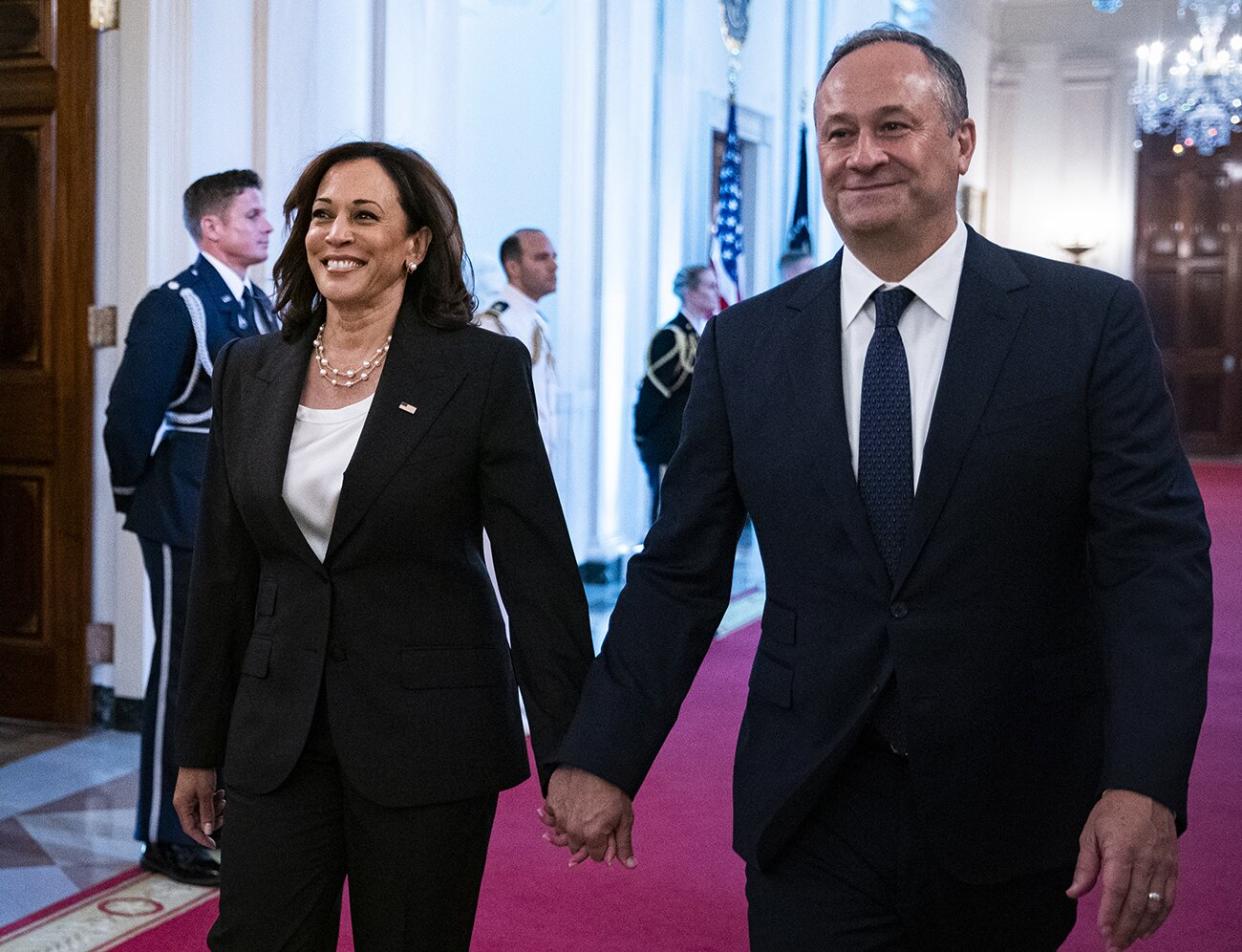 US Vice President Kamala Harris, left, and Second Gentleman Doug Emhoff