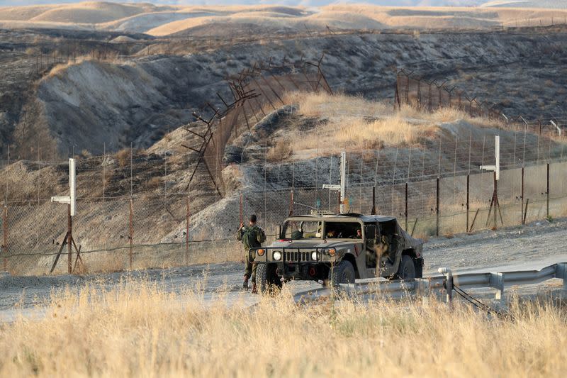 FILE PHOTO: Israeli soldiers keep guard in Jordan Valley, the eastern-most part of the Israeli-occupied West Bank that borders Jordan