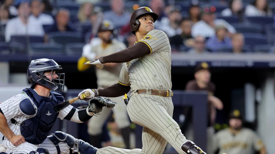 May 26, 2023; Bronx, New York, USA; San Diego Padres left fielder Juan Soto (22) follows through on a two run home run against the New York Yankees during the fifth inning at Yankee Stadium.