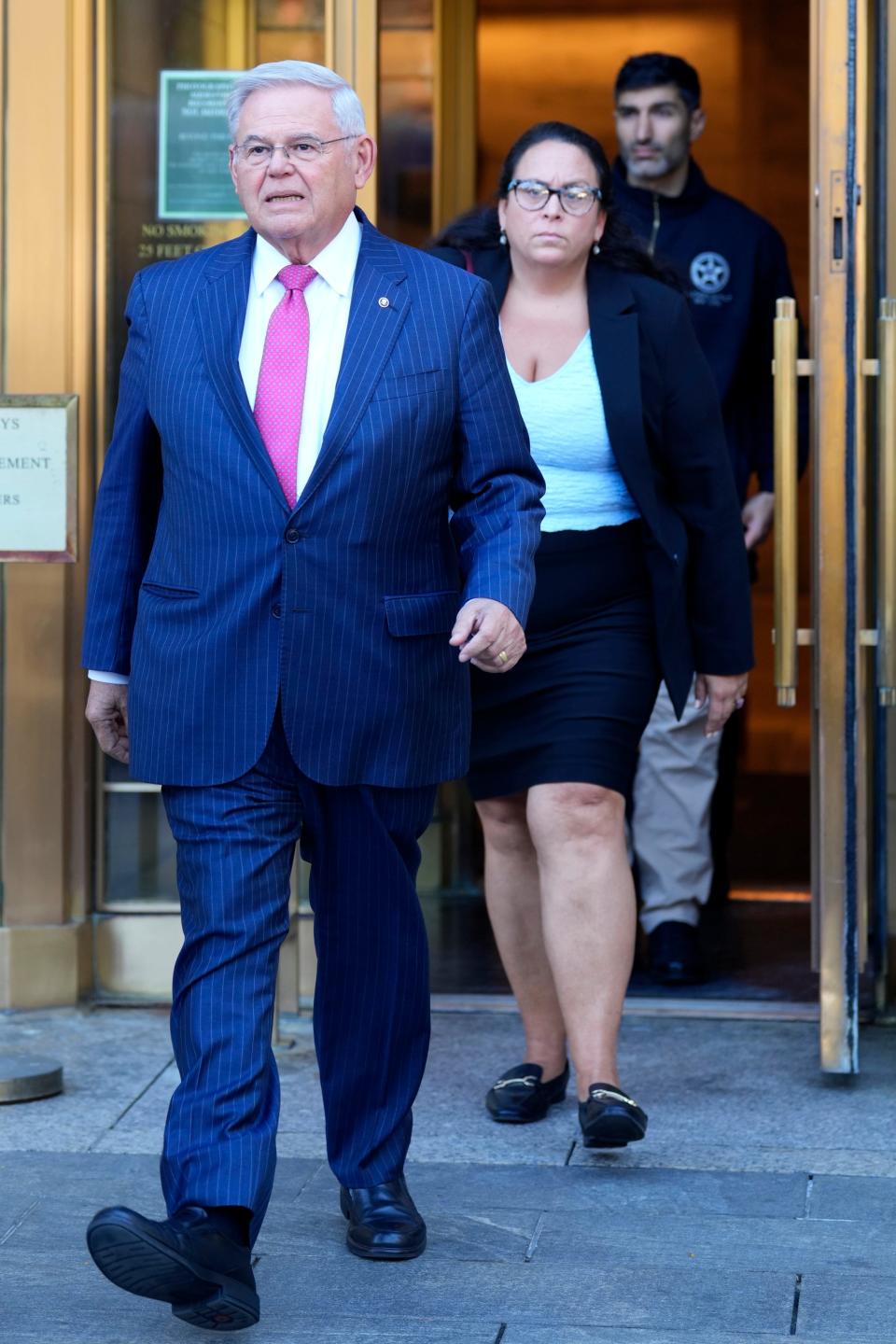 Senator Bob Menendez is shown as he exits federal court in the Southern District of New York, in lower Manhattan, after pleading not guilty, Monday, October 23, 3023.