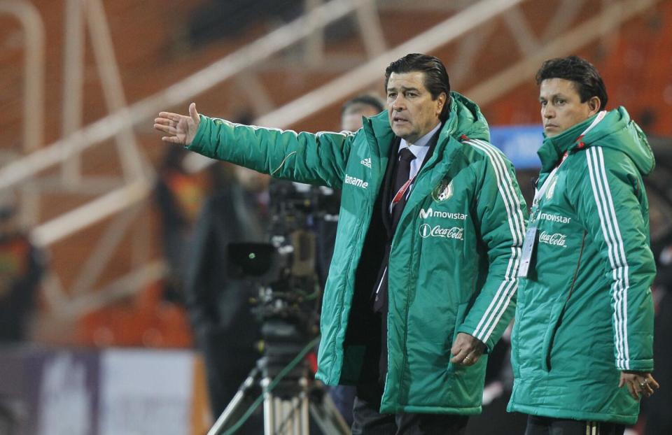 Mexico's coach Luis Tena, left, gestures