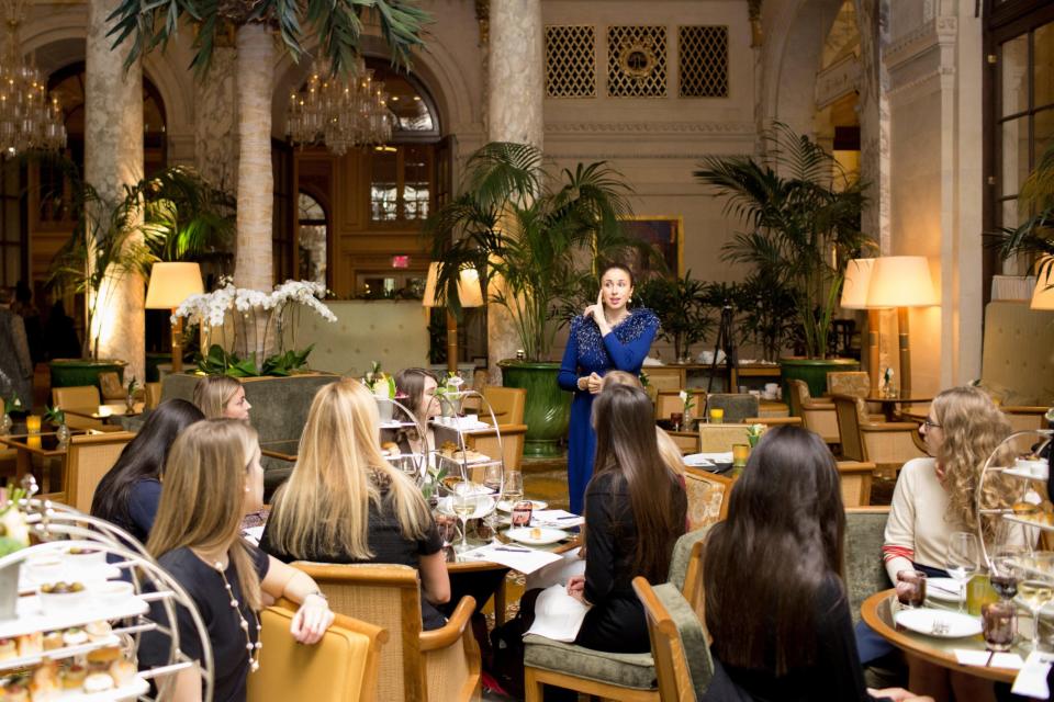 Meier teaches dining etiquette to a group. - Copyright: Beaumont Etiquette