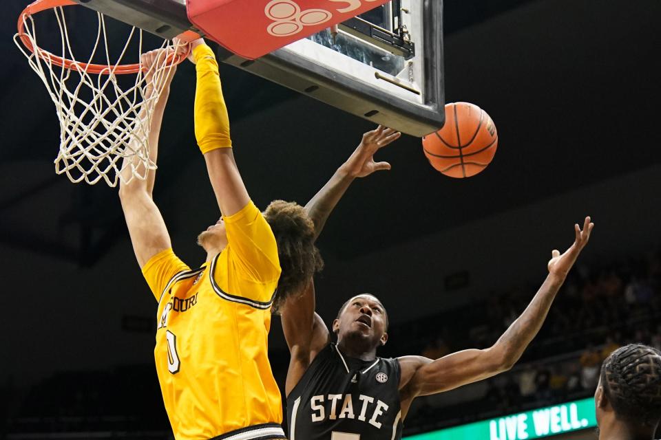 Feb 10, 2024; Columbia, Missouri, USA; Missouri Tigers forward Jordan Butler (0) looses the ball as Mississippi State Bulldogs guard Shawn Jones Jr. (5) attempts the rebound uring the first half at Mizzou Arena. Mandatory Credit: Denny Medley-USA TODAY Sports