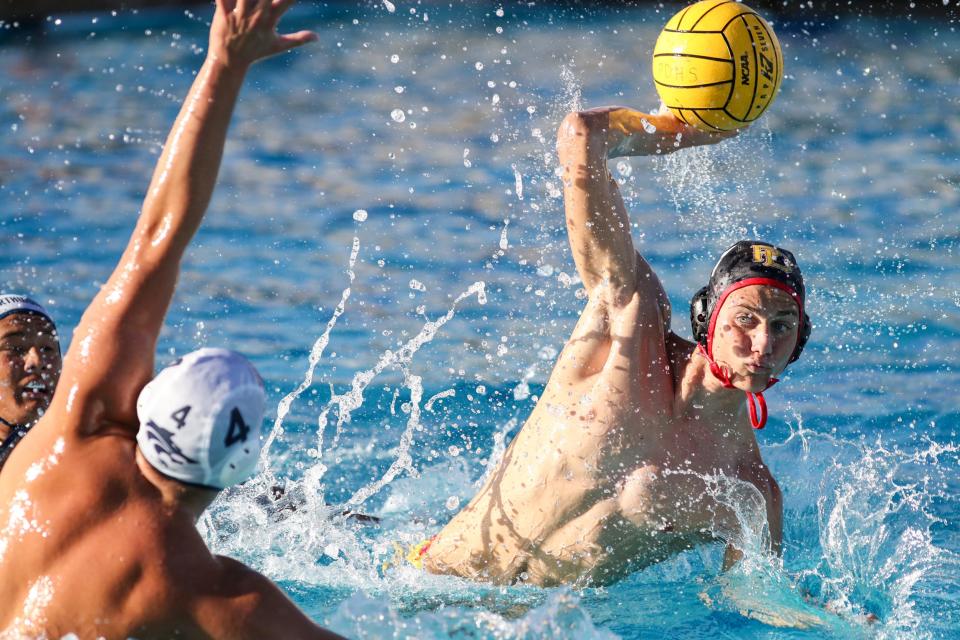 Jack Baker of Palm Desert High School water polo takes a shot on goal against Northwood of Irvine in their CIF-SS Division 2 round one playoff game in Palm Desert, Calif., on Tuesday, Oct. 31, 2023.