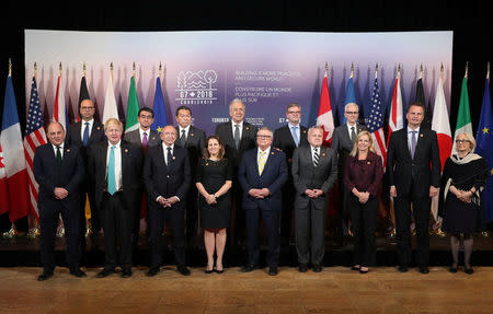 Security Ministers and Foreign Ministers pose for a group photo on the second day of Foreign ministers meetings from G7 countries in Toronto, Ontario, Canada April 23, 2018. REUTERS/Fred Thornhill
