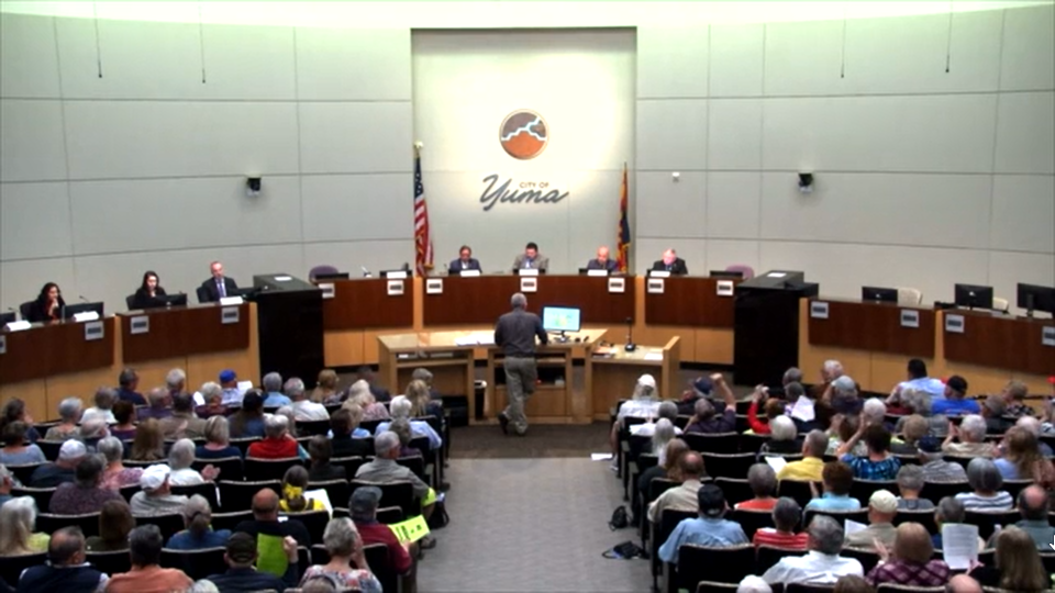 The Yuma County Board of Supervisors listens to a proposal for rezoning for higher-density housing to accommodate a large  development in the Fortuna Foothills area. The meeting on March 6, 2023, drew a crowd of concerned residents.