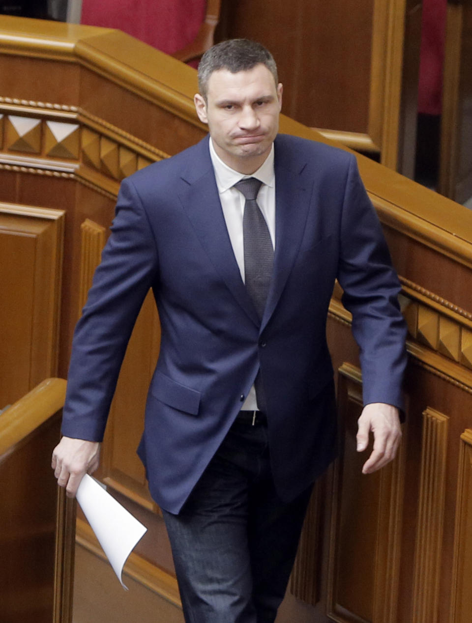 Ukrainian lawmaker, chairman of the Udar (Punch) party and former WBC heavyweight boxing champion Vitali Klitschko prior his speech at Ukrainian parliament in Kiev, Ukraine, Tuesday, March 11, 2014. Ukrainian Prime Minister Arseniy Yatsenyuk on Tuesday reiterated his call for Western nations to defend Ukraine against Russia.(AP Photo/Efrem Lukatsky)