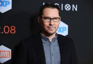 <p>Director Bryan Singer has faced accusations of sexual misconduct involving minors since 1997, when the parents of an underage extra sued him for filming their son and other boys on the set of the movie <em>Apt Pupil</em>. Model Michael Egan sued him for sexual assault of a minor in 2014 (the case was withdrawn), and an anonymous plaintiff sued him for sexual assault in 2014 (that case was dismissed). In 2017, Cesar Sanchez-Guzman filed a lawsuit in Washington and alleged that Singer had raped him when he was a teenager.</p> <p>Allegations against Singer have surfaced amid the MeToo movement and gained more attention after he was fired from directing the film <em>Bohemian Rhapsody</em>, which got nominated for an Oscar. On Jan. 23, <a href="https://www.theatlantic.com/magazine/archive/2019/03/bryan-singers-accusers-speak-out/580462/" rel="nofollow noopener" target="_blank" data-ylk="slk:The Atlantic;elm:context_link;itc:0;sec:content-canvas" class="link "><em>The Atlantic</em></a> published a lengthy article in which four men detail abuse and assault at the hands of the director.</p> <p><strong>His response:</strong></p> <p>The article in <em>The Atlantic</em> was originally going to appear in <em>Esquire</em>. Ahead of the piece, Singer released a statement on Instagram. “I have known for some time that Esquire magazine may publish a negative article about me,” he wrote. “They have contacted my friends, colleagues, and people I don’t even know. In today’s climate where people’s careers are being harmed by mere accusations, what Esquire is attempting to do is a reckless disregard for the truth, making assumptions that are fictional and irresponsible.”</p> <p>When <em>The Atlantic</em> asked for comment, Singer's legal representative Andrew Brettler said that Singer "has never been arrested for or charged with any crime" and that he "categorically denies ever having sex with, or a preference for, underage men."</p> <p><strong>The fallout:</strong> Although 20th Century Fox fired Singer from <em>Bohemian Rhapsody</em> and replaced him with Dexter Fletcher, sources have said the reason had to do with Singer's unexplained absences on set. He still remains listed as the director of the Freddie Mercury biopic and recently secured a high-profile job remaking the film <em>Red Sonja</em>.</p>