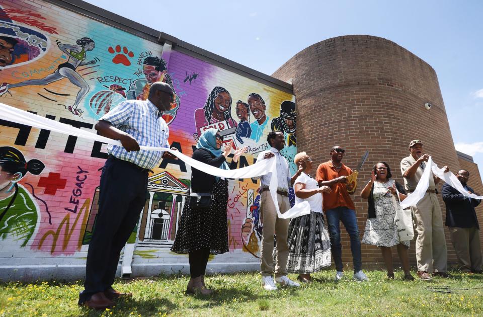 The UrbanArt Commission and the city of Memphis' Department of Comprehensive Planning celebrate the completion of a new mural by local artist Tony Hawkins at the Whitehaven Community Center on Friday, June 3, 2022.