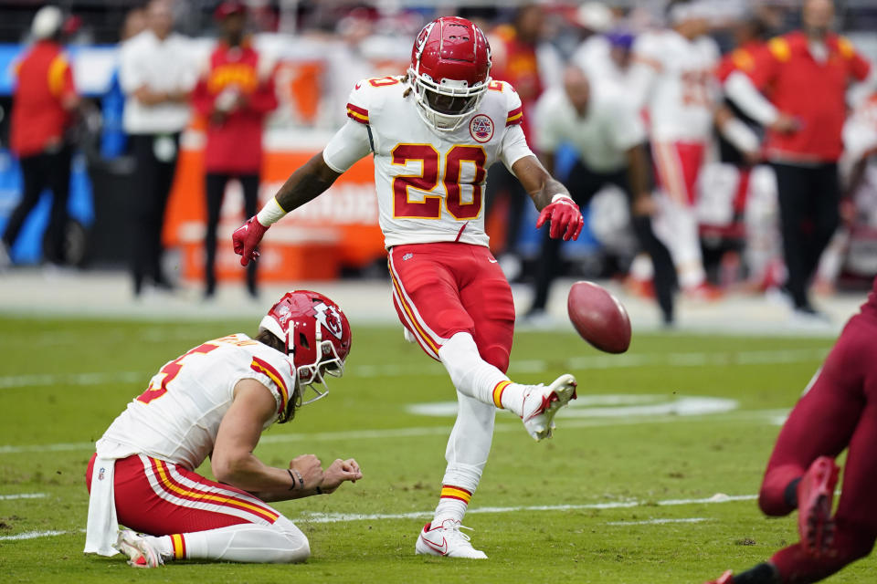 Kansas City Chiefs safety Justin Reid (20) misses an extra point attempt against the Arizona Cardinals during the first half of an NFL football game, Sunday, Sept. 11, 2022, in Glendale, Ariz. (AP Photo/Ross D. Franklin)