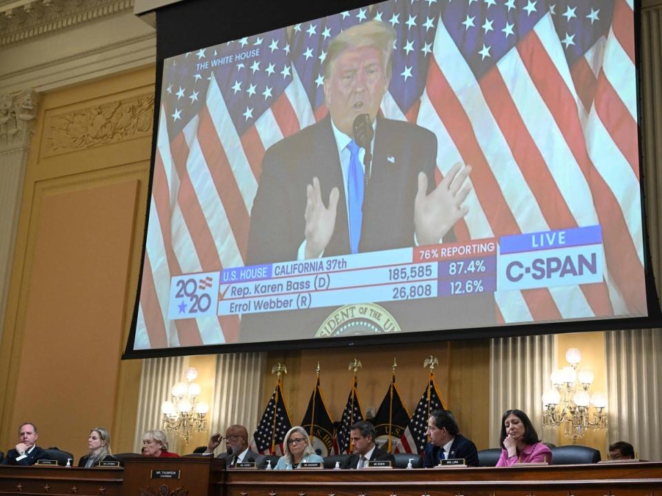 A video image of former US president Donald Trump is seen on a screen during a House Select Committee hearing to Investigate the January 6th Attack on the US Capitol, in the Cannon House Office Building on Capitol Hill in Washington, DC on June 13, 2022 (AFP via Getty Images)