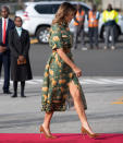 Melania boarded her military plane for Cairo, Egypt, wearing an animal print shirt dress. The First Lady finished the look with a brown belt and matching heels. [Photo: Getty]