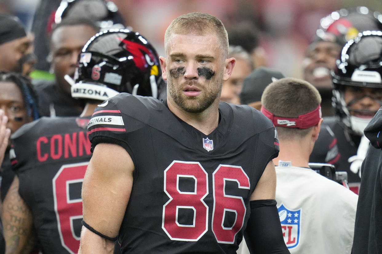 FILE - Arizona Cardinals tight end Zach Ertz pauses on the field prior to an NFL football game against the Cincinnati Bengals Sunday, Oct. 8, 2023, in Glendale, Ariz. The Arizona Cardinals released veteran tight end Zach Ertz on Thursday, Nov. 30, clearing the way for the rapidly-improving Trey McBride to assume the starting role. The 33-year-old Ertz is a three-time Pro Bowl selection who has spent the past five games on injured reserve with a quadriceps injury. (AP Photo/Ross D. Franklin, File)