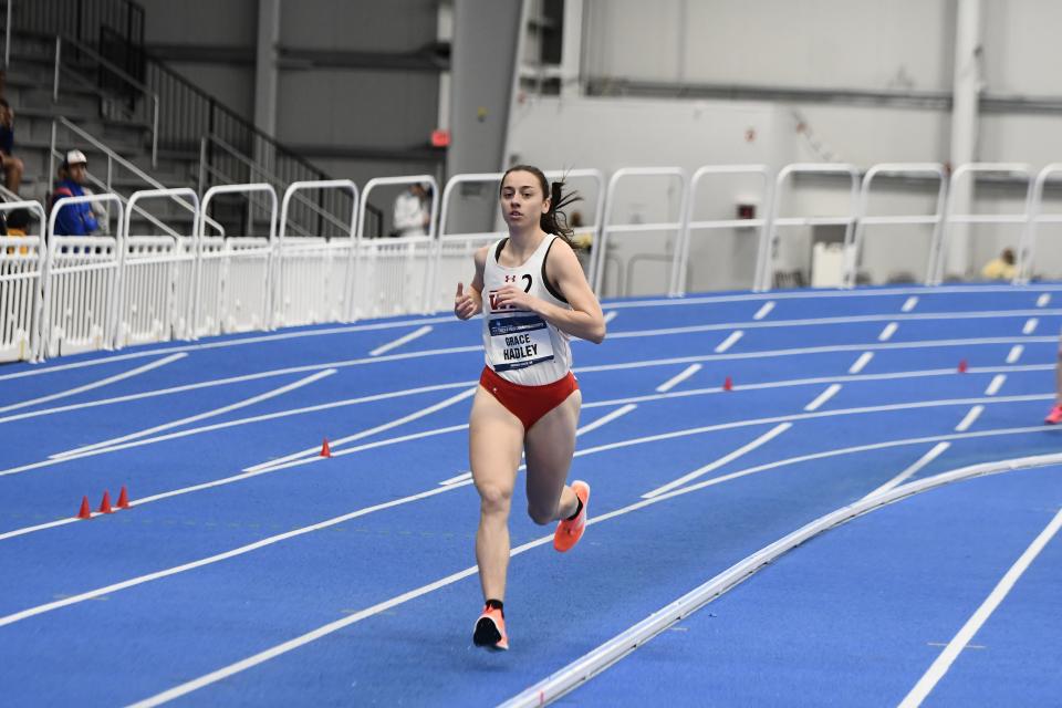 WPI's Grace Hadley is all alone as she nears victory in the mile at the NCAA Division 3 Championships.
