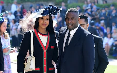 dris Elba and Sabrina Dhowre arrives at St George's Chapel  - Credit:  Ian West/PA Wire