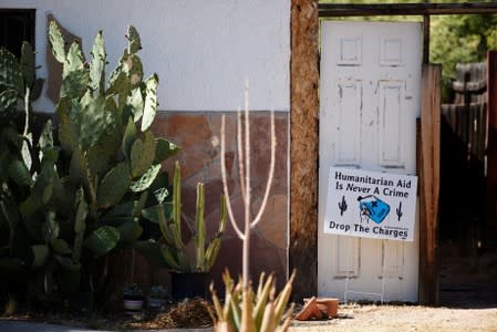 A sign showing support is displayed in a neighborhood near the Evo A. DeConcini U.S. Courthouse, where humanitarian volunteer Scott Warren faces charges of harboring, and conspiracy to transport undocumented migrants in Tucson