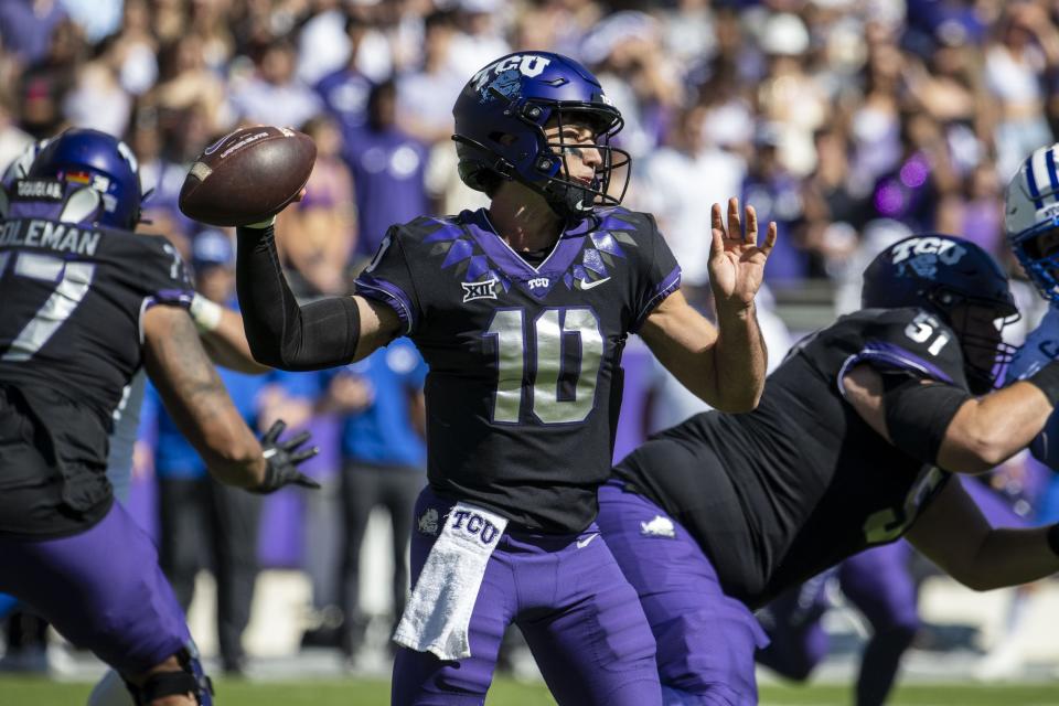 Oct 14, 2023; Fort Worth, Texas, USA; TCU Horned Frogs quarterback Josh Hoover (10) passes against the Brigham Young Cougars during the game at Amon G. Carter Stadium. Mandatory Credit: Jerome Miron-USA TODAY Sports