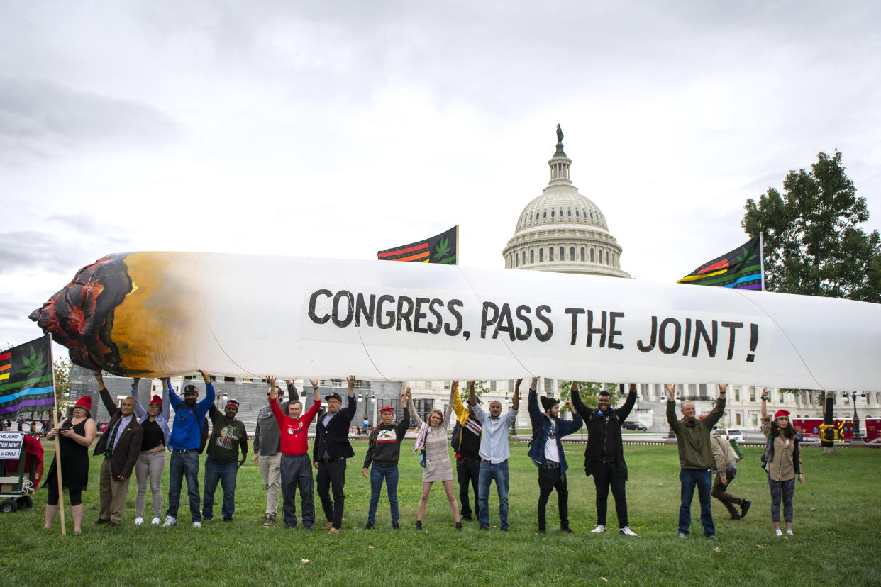 UNITED STATES -  OCTOBER 8: Marijuana activists hold up a 51-foot inflatable joint during a rally at the U.S. Capitol to call on Congress pass cannabis reform legislation on Tuesday, Oct. 8, 2019. (Photo by Caroline Brehman/CQ-Roll Call, Inc via Getty Images)