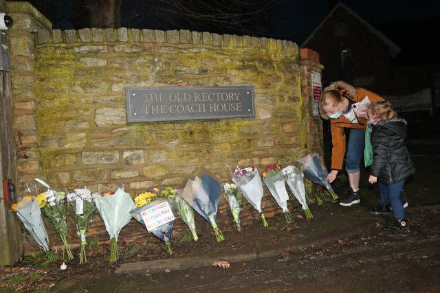 Floral tributes left outside the home of Sir Tom (Yui Mok/PA)