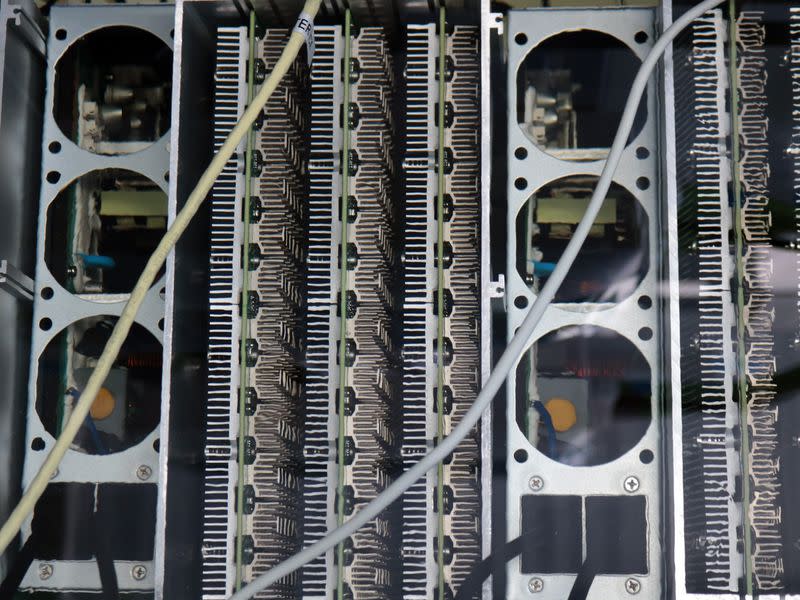 Bitcoin mining ASICs submerged in immersion cooling liquid at a facility in southern Spain. (Eliza Gkritsi)