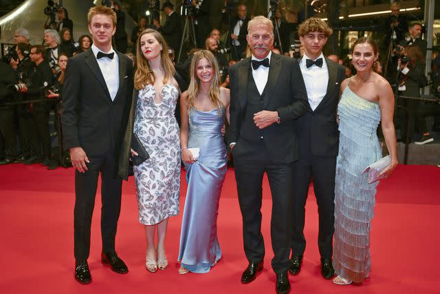 <p>CHRISTOPHE SIMON/AFP via Getty</p> Kevin Costner poses with his kids Cayden Wyatt Costner, Lily Costner, Grace Avery Costner, Hayes Costner and Annie Costner at Cannes Film Festival on May 19, 2024