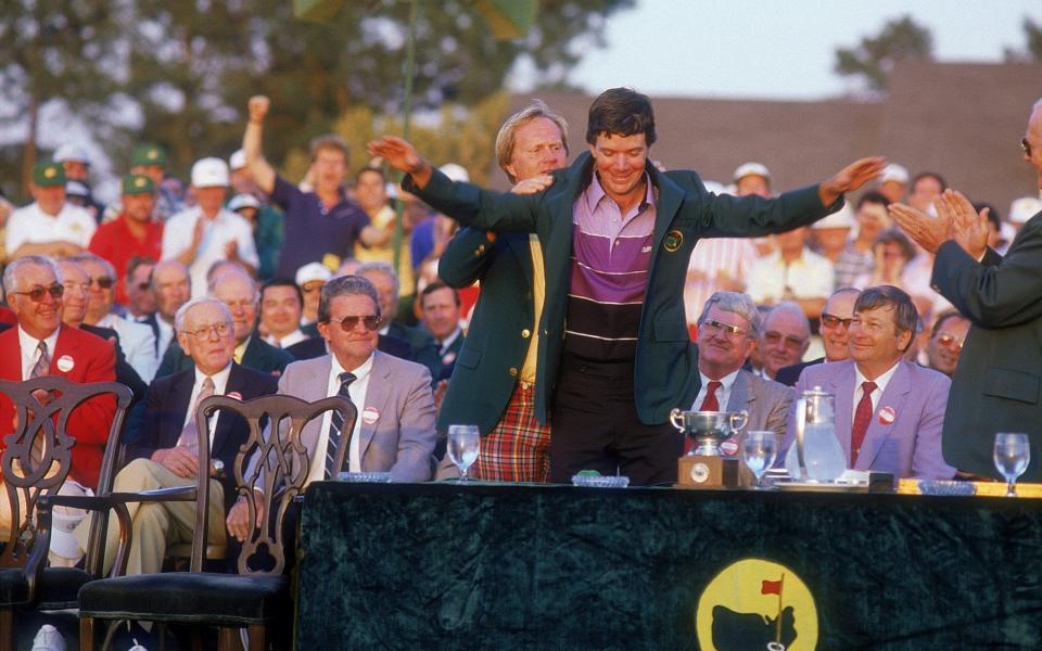 Jack Nicklaus of the USA presents Larry Mize of the USA with his green jacket after the thrilling US Masters 1987 second play-off hole held at the Augusta National Golf Course, in Augusta, Georgia - Getty Images Fee /David Cannon 