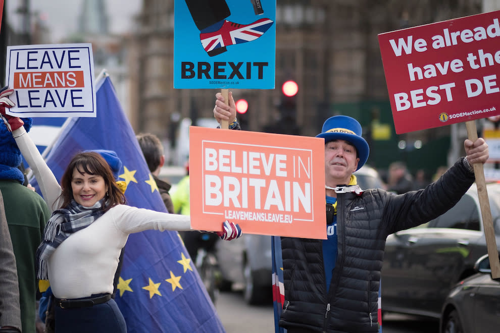 Pro and anti-Brexit demonstrators outside the Houses of Parliament in London before Tuesday’s Commons vote (Picture: PA)