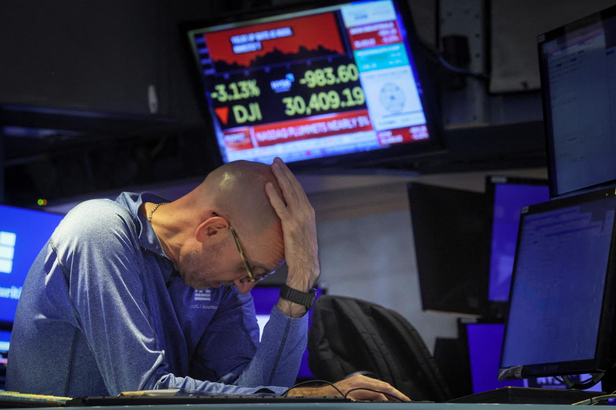 A trader works on the floor of the New York Stock Exchange (NYSE) in New York City, U.S., June 13, 2022.  REUTERS/Brendan McDermid