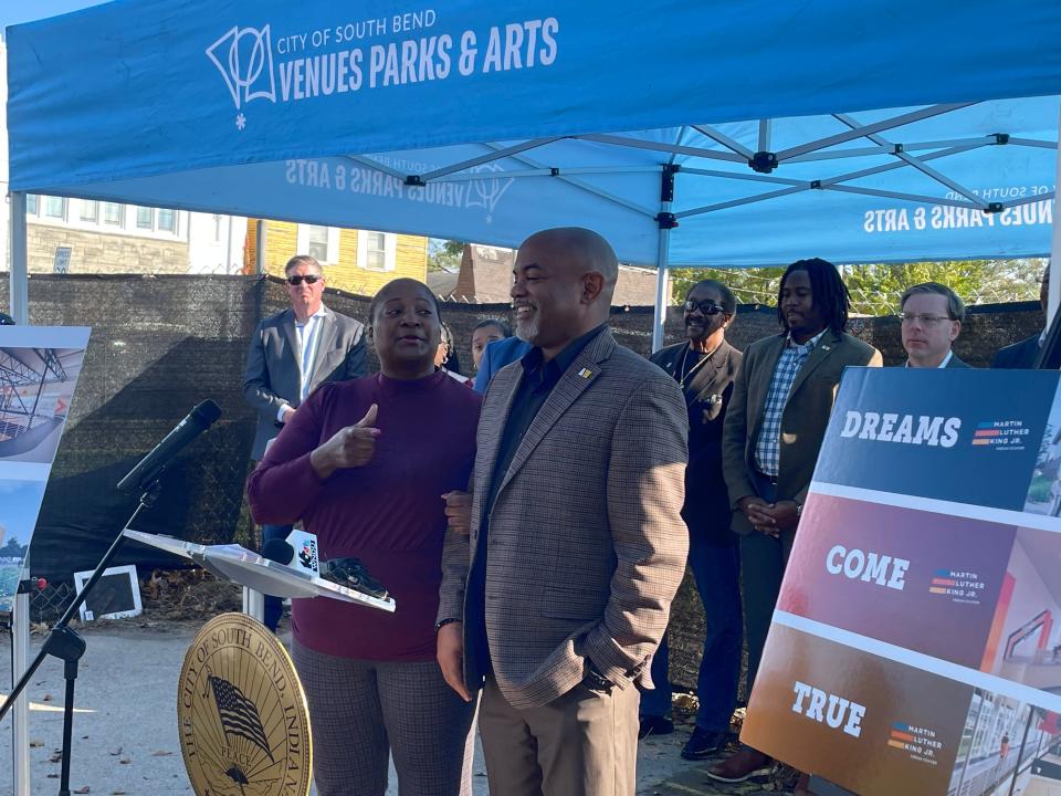 South Bend Common Council president Sharon McBride jokes with Maurice Scott, South Bend's director of community initiatives and the longtime director of the King Center, at a ceremony Oct. 24, 2023, to announce the final construction plans for the building.