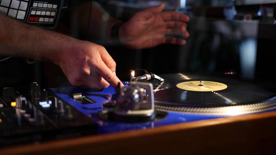 Guest DJ Jason Perez spins vinyl during a special event at Jan’s Place in San Luis Obispo on March 13, 2024.