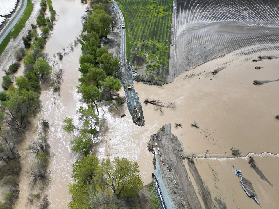 This aerial view shows the broken levee in Pajaro, California, on March 13, 2023. 