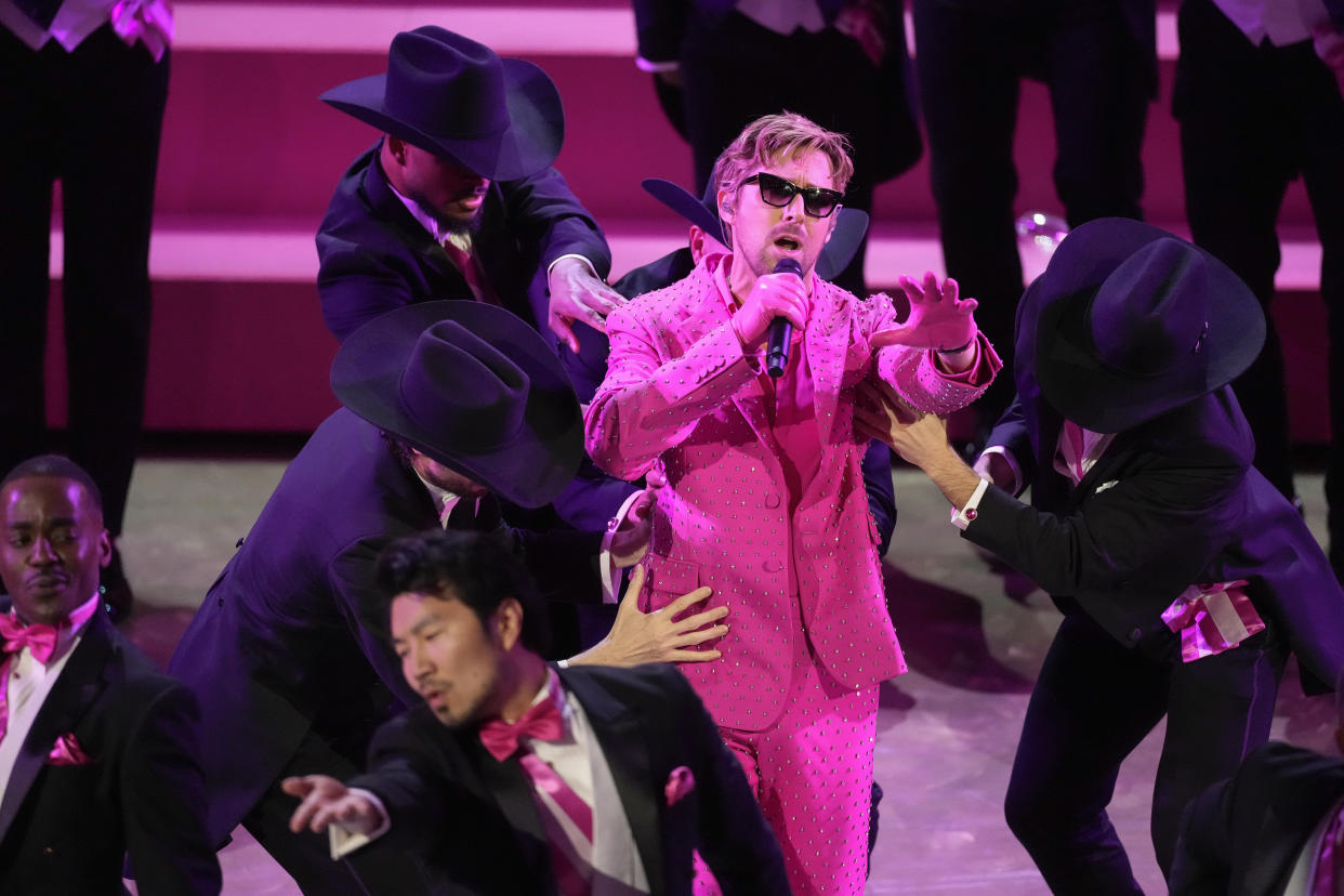 Ryan Gosling, in pink, performs the song 