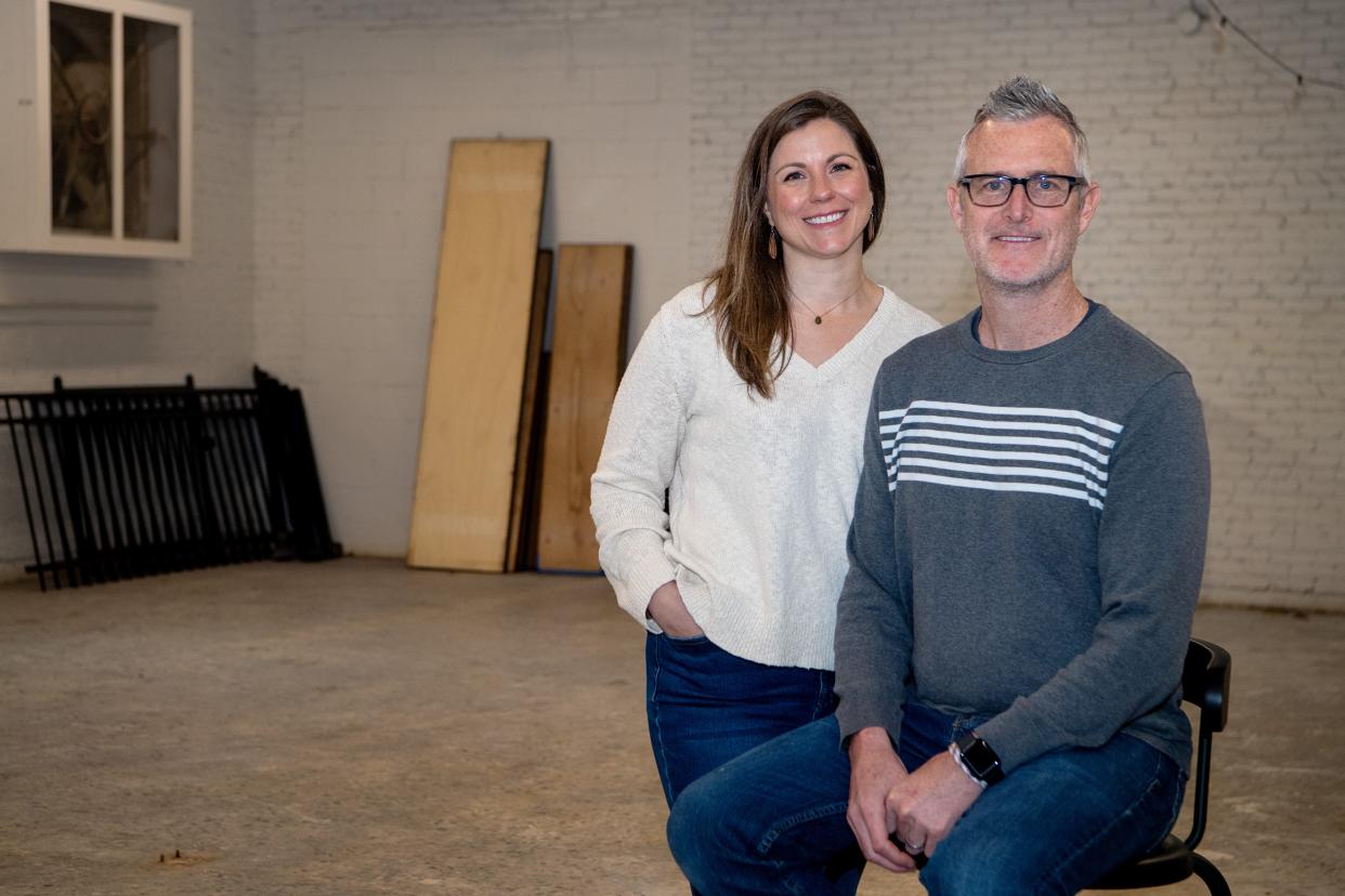 Josh and Shannon Brewer in their future brewing space on Sweeten Creek Road in Asheville.