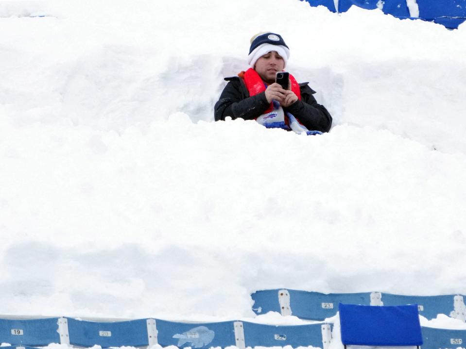 A Buffalo Bills fan watches the game at Highmark Stadium, New York, 15 January (Kirby Lee/USA TODAY Sports via Reuters)