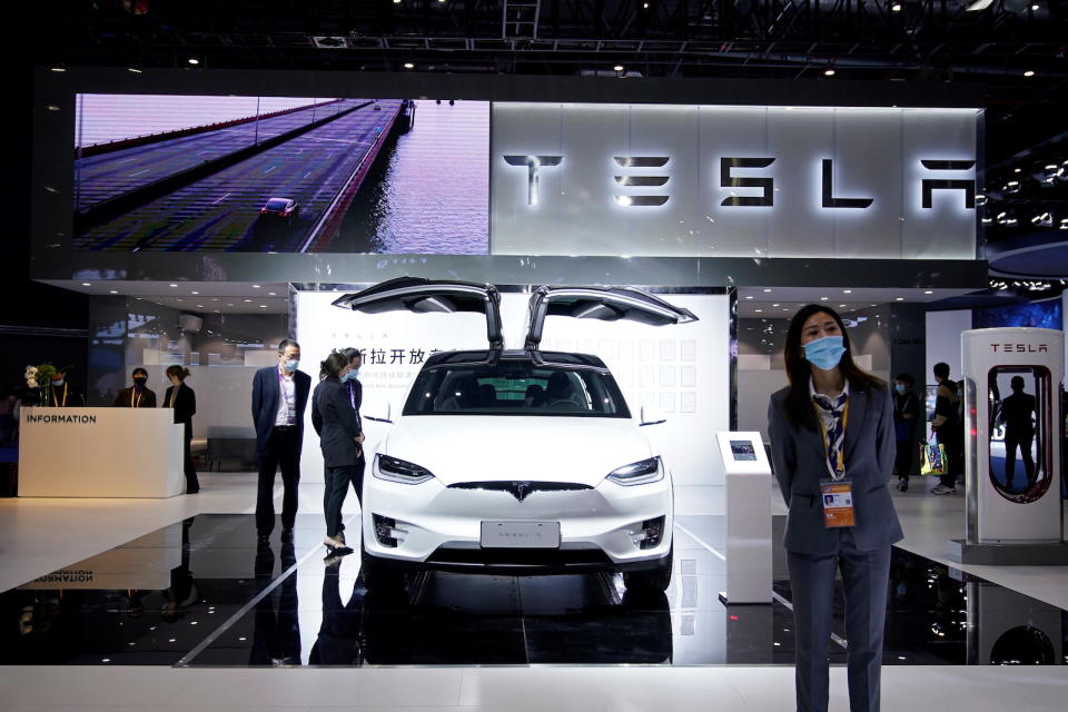 Tesla sign is seen at the third China International Import Expo (CIIE) in Shanghai, China November 5, 2020. REUTERS/Aly Song - RC2XWJ9JXLB4