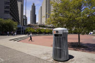 A prototype trash can called Salt and Pepper is seen near the Embarcadero in San Francisco on July 26, 2022. What takes years to make and costs more than $20,000? A trash can in San Francisco. The pricey, boxy bin is one of three custom-made trash cans the city is testing this summer as part of its yearslong search for another tool to fight its battle against dirty streets. (AP Photo/Eric Risberg)