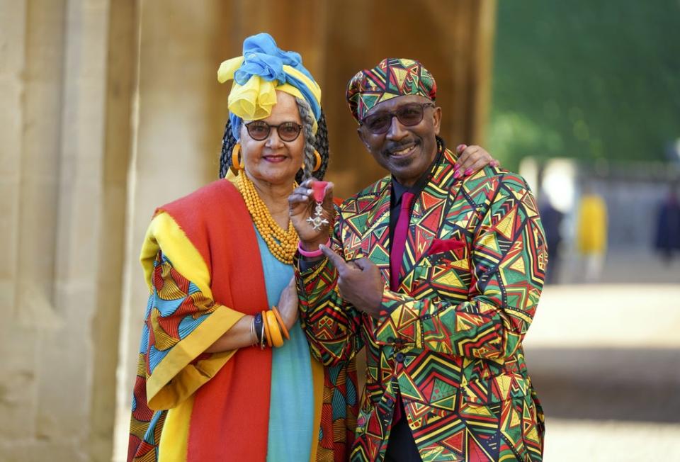 Fitness guru Derrick Evans with his wife Sandra after being made an MBE (Steve Parsons/PA) (PA Wire)