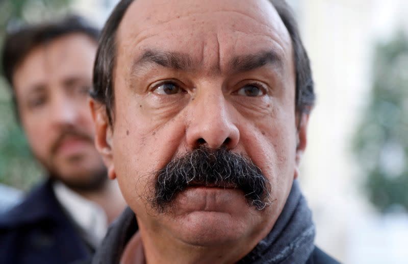 FILE PHOTO: French CGT labour union leader Philippe Martinez leaves after a meeting with Prime Minister Edouard Philippe in Paris