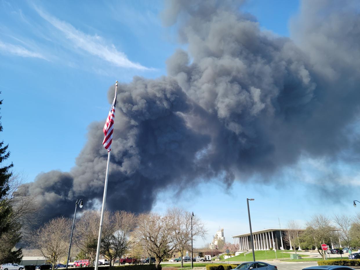 Smoke rises from an industrial fire April 11, 2023, at 358 NW F St. in Richmond.