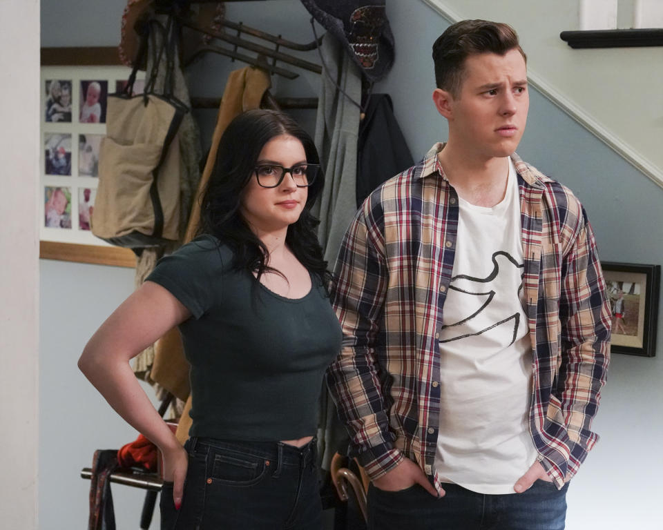 This image released by ANC shows Ariel Winter, left, and Nolan Gould in a scene from "Modern Family." The popular comedy series ends its 11-season run with a two-hour finale on Wednesday. (Eric McCandless/ABC via AP)