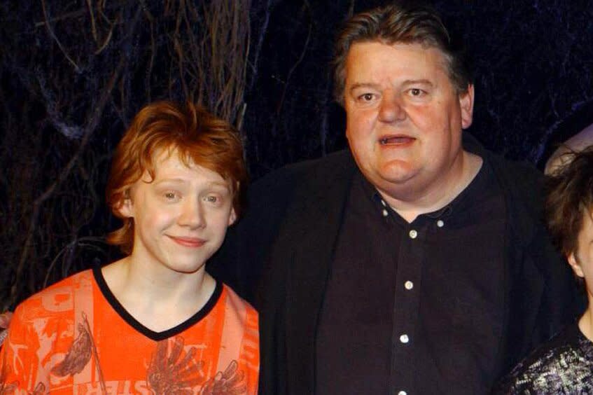 The stars of Harry Potter and the Chamber of Secrets, from left to right; Rupert Grint, Robbie Coltrane, Daniel Radcliffe Emma Watson during the worldwide launch of the DVD/VHS at Leavesden Studios in north London. (Photo by Yui Mok - PA Images/PA Images via Getty Images)