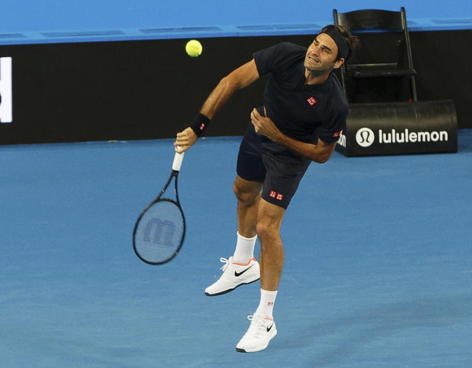 Roger Federer of Switzerland during his mixed doubles match with Belinda Bencic, against Cameron Norrie and Katie Boulter of Britain at the Hopman Cup in Perth, Australia, Sunday Dec. 30, 2018. (AP Photo/Trevor Collens)